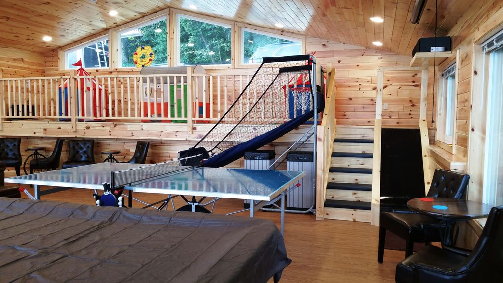 Access to the Kid's Play Loft is via staircase. Adjacent slide is a big hit!