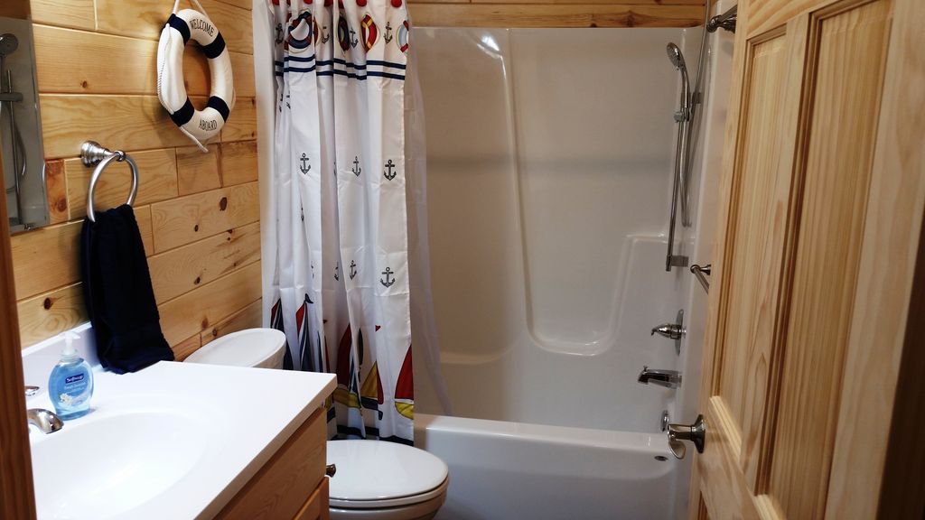 Two of the 12 BAs have bathtub showers, 1 in the BR + 1 in the hallway on main level.