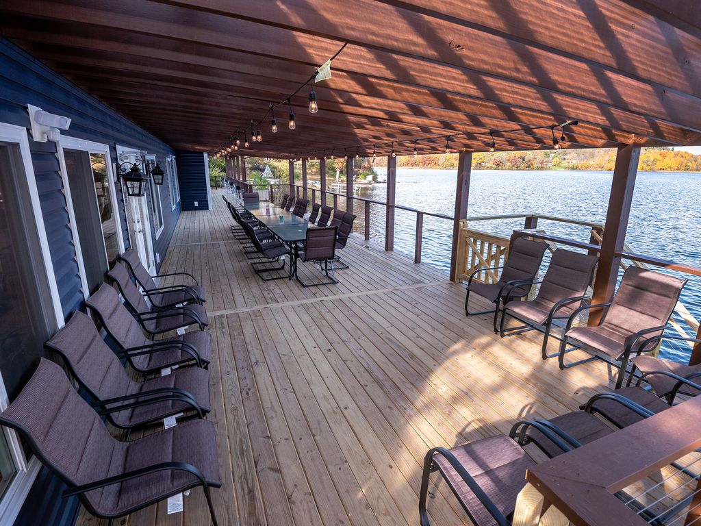 Deck + Patio below have total of 6 tables and 42 spring-action deck chairs.