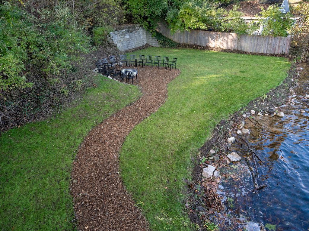 Firepit area great for yard games like cornhole. Shoreline clean-up scheduled!