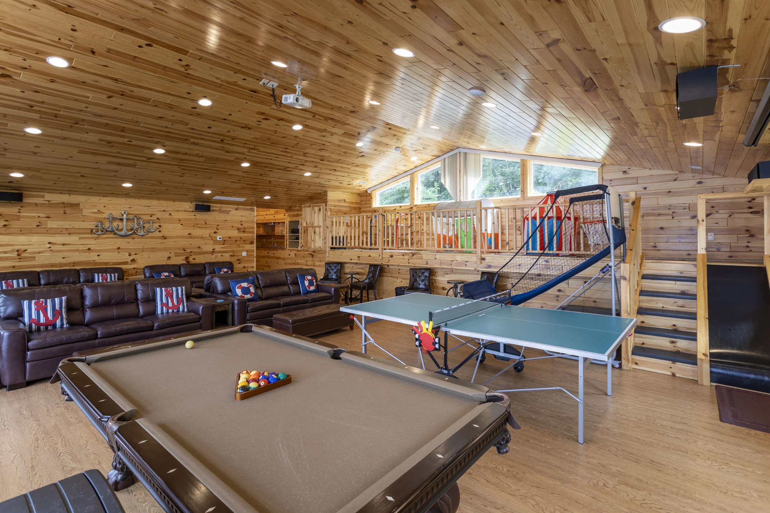Access to the Kid's Play Loft is via staircase. Adjacent slide is a big hit!