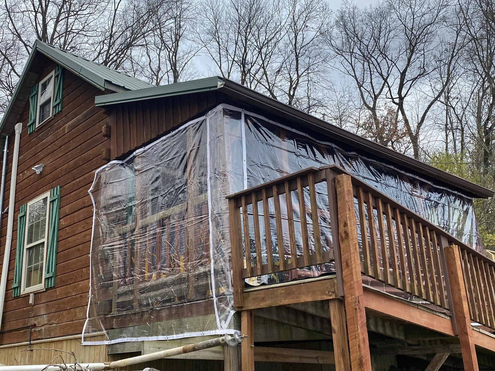 The Winter Porch Wrap acts as a blanket, helping to keep the porch cozy in cold weather.