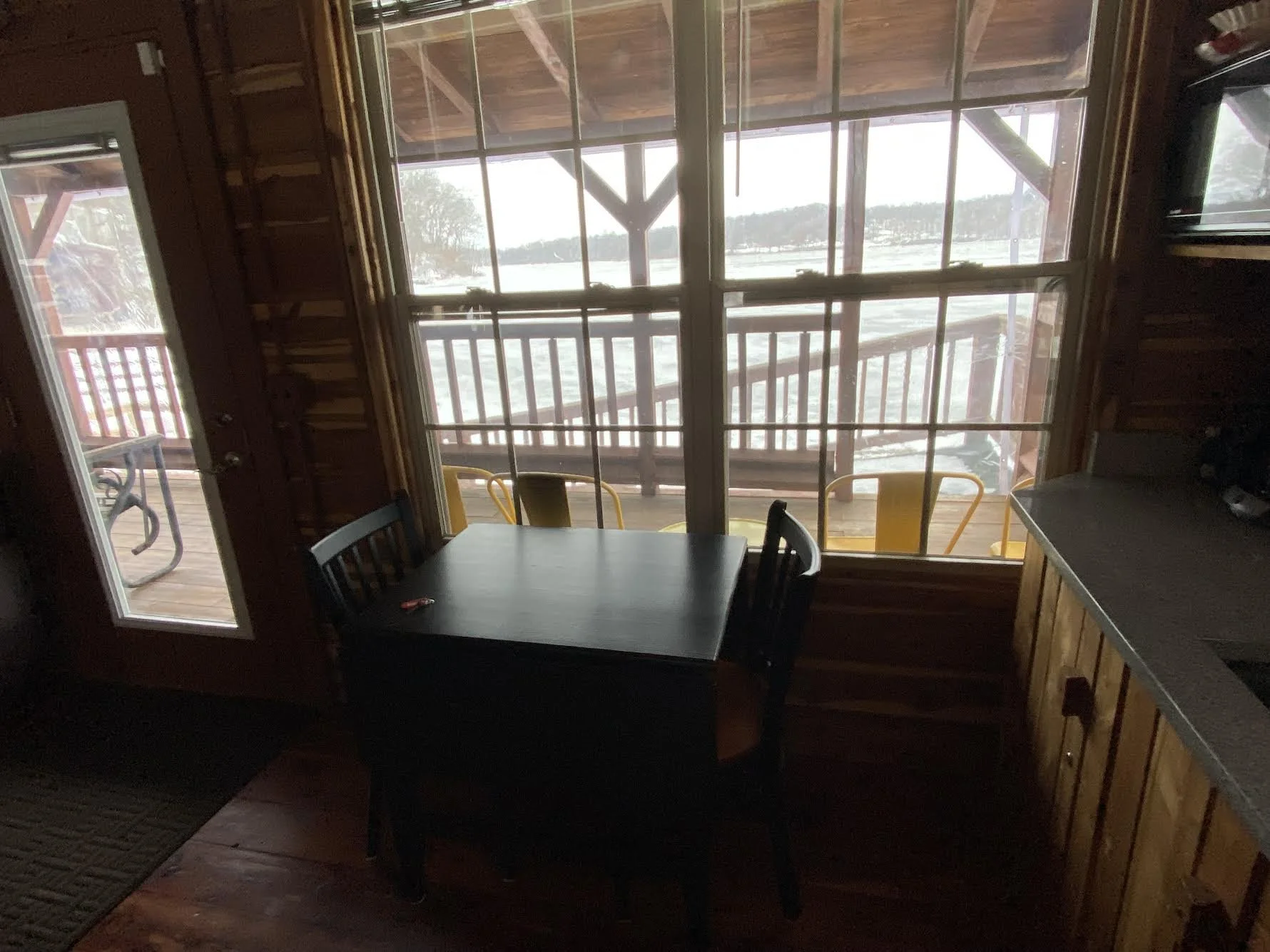 Shot of frozen Stone Lake, peering though the Winter Porch Wrap.