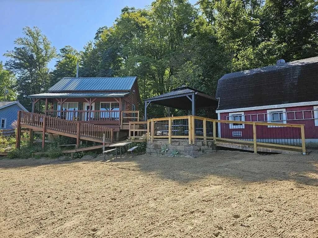 Accessible ramp brings the sandy beach within reach of everyone. (Photo taken before beach-cleanup!)