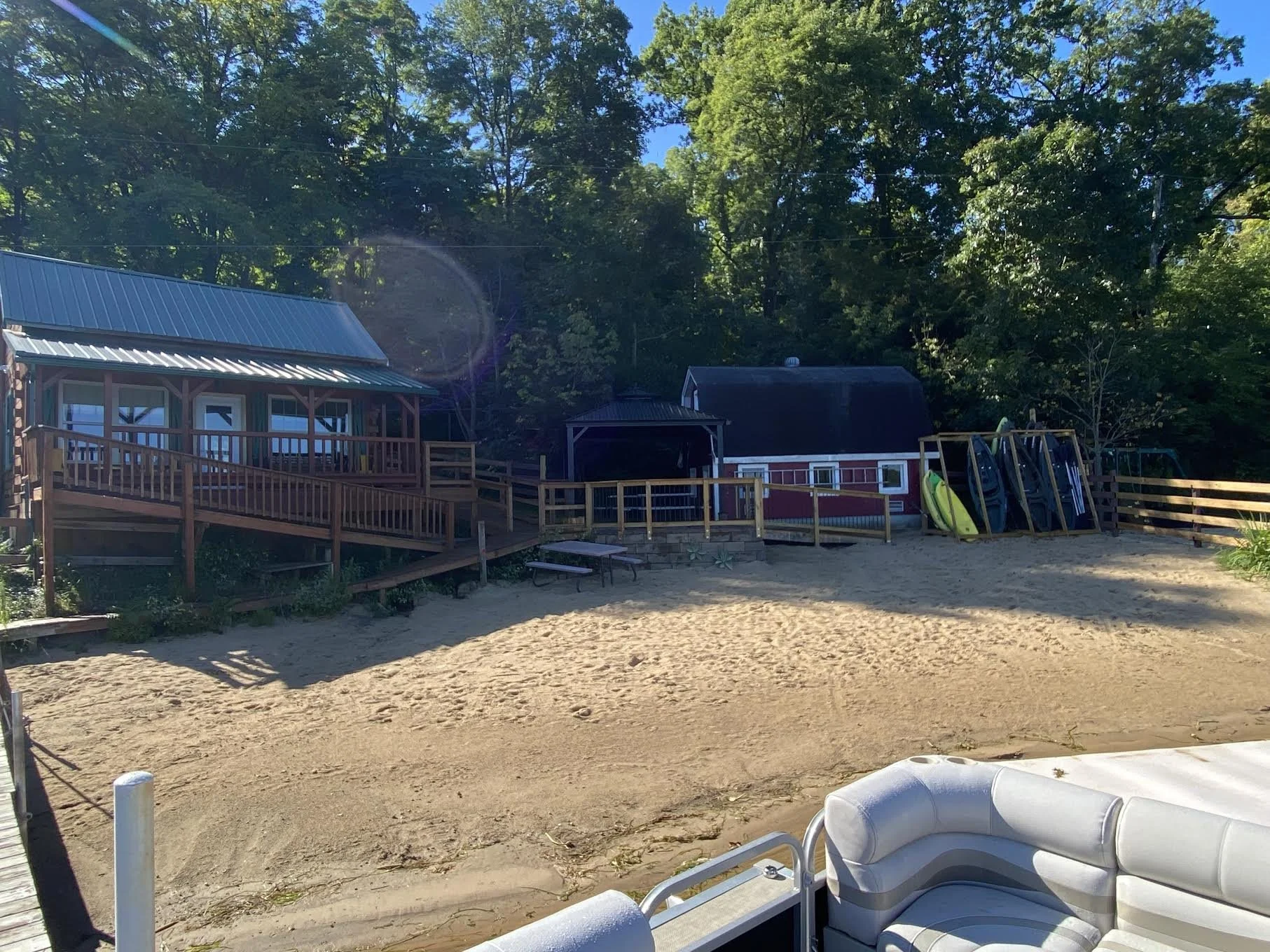 Sandy beach enlarged to 75 ft wide. (Photo taken before beach cleanup!)