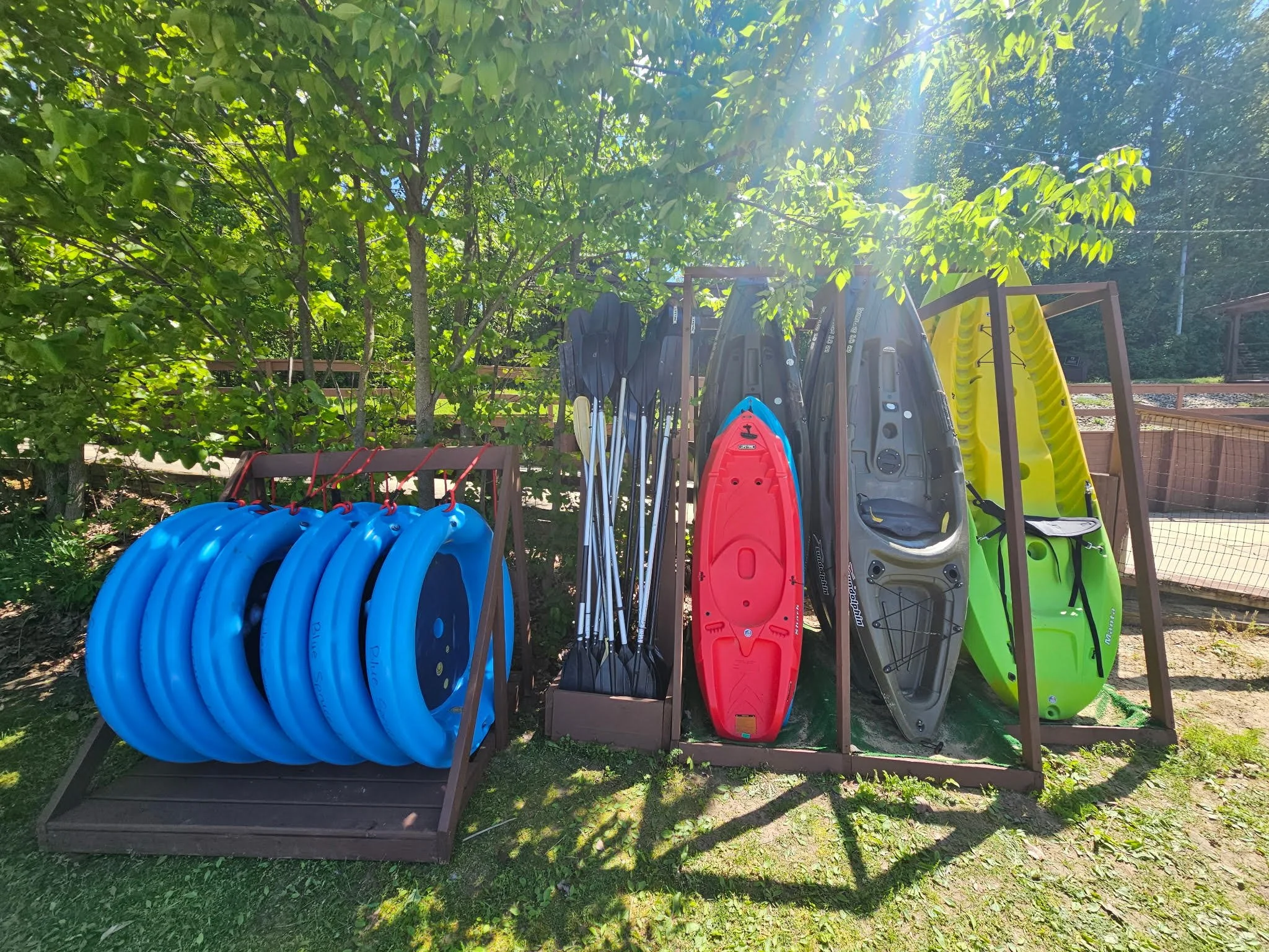 The Pontoon Boating Pkg includes 7 adult kayaks, 2 child kayaks, 2 two-person adult kayaks, and 5 super fun round Corcls