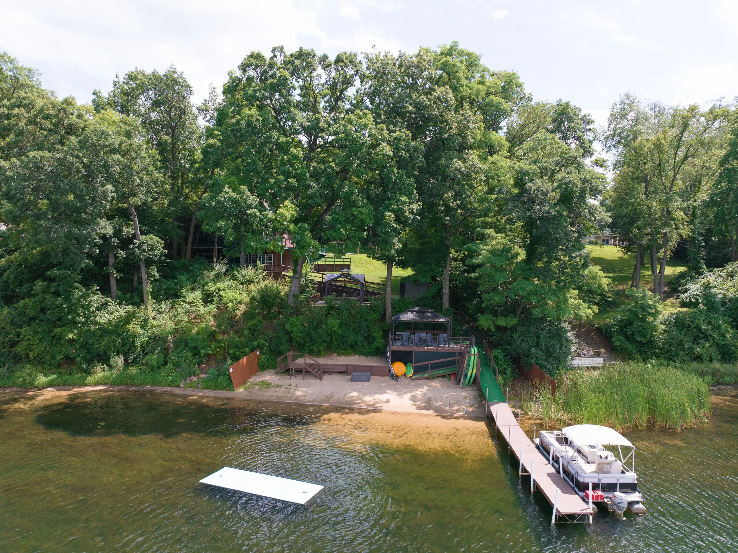 Gentle slope sandy beach w/ lots of water toys keeps the young ones entertained.