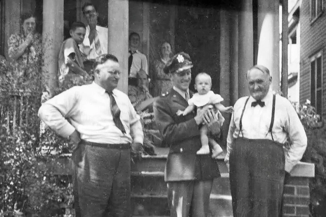 This Memorial Day, we pause with gratitude for all who served.

In this family photo, circa 1944, Rudy Hoerr is pictured in his military uniform, holding his daughter Linda. He stands between his grandfather and his father, David August Hoerr, the fo