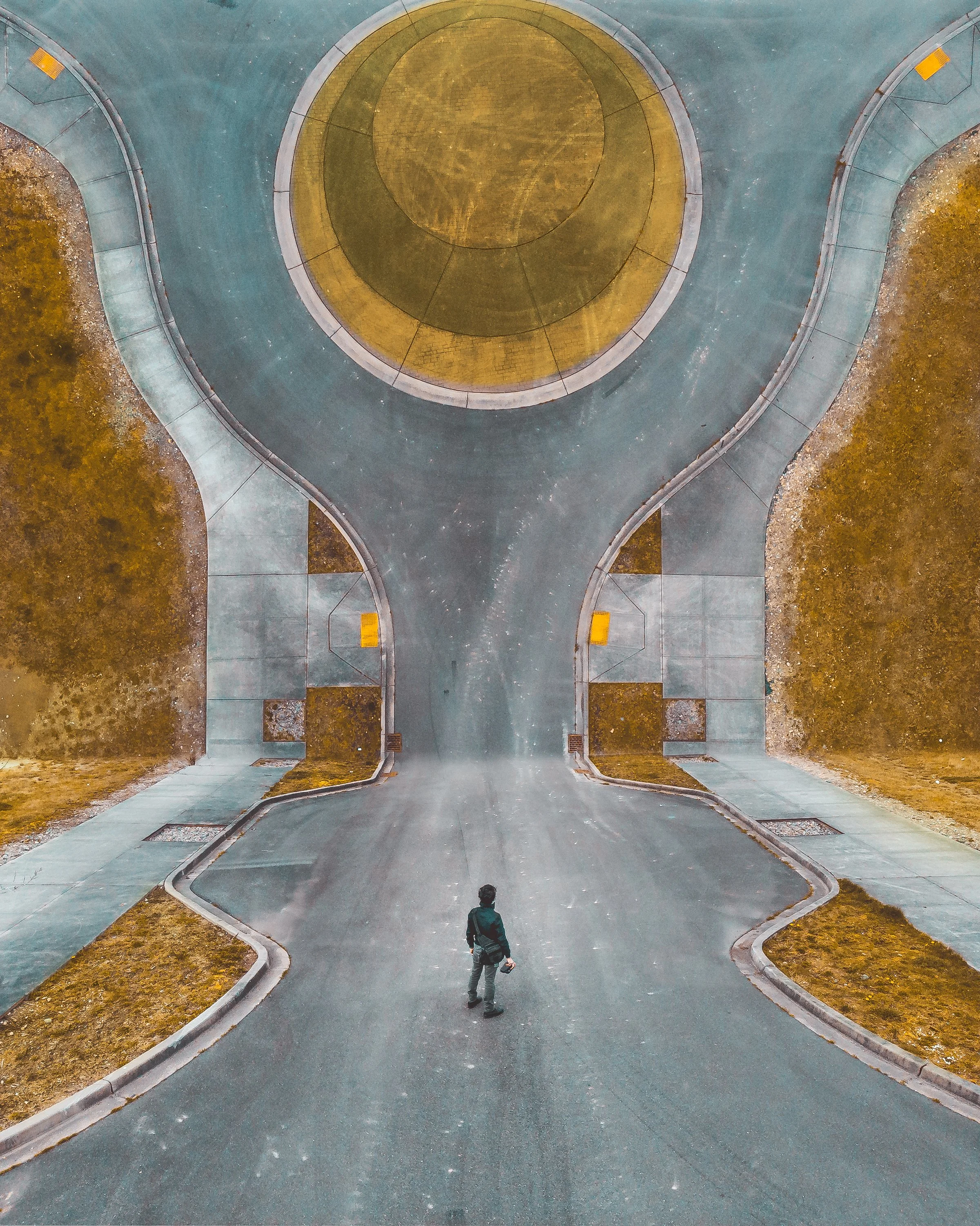 abstract-image-of-man-standing-in-road_4460x4460.jpg