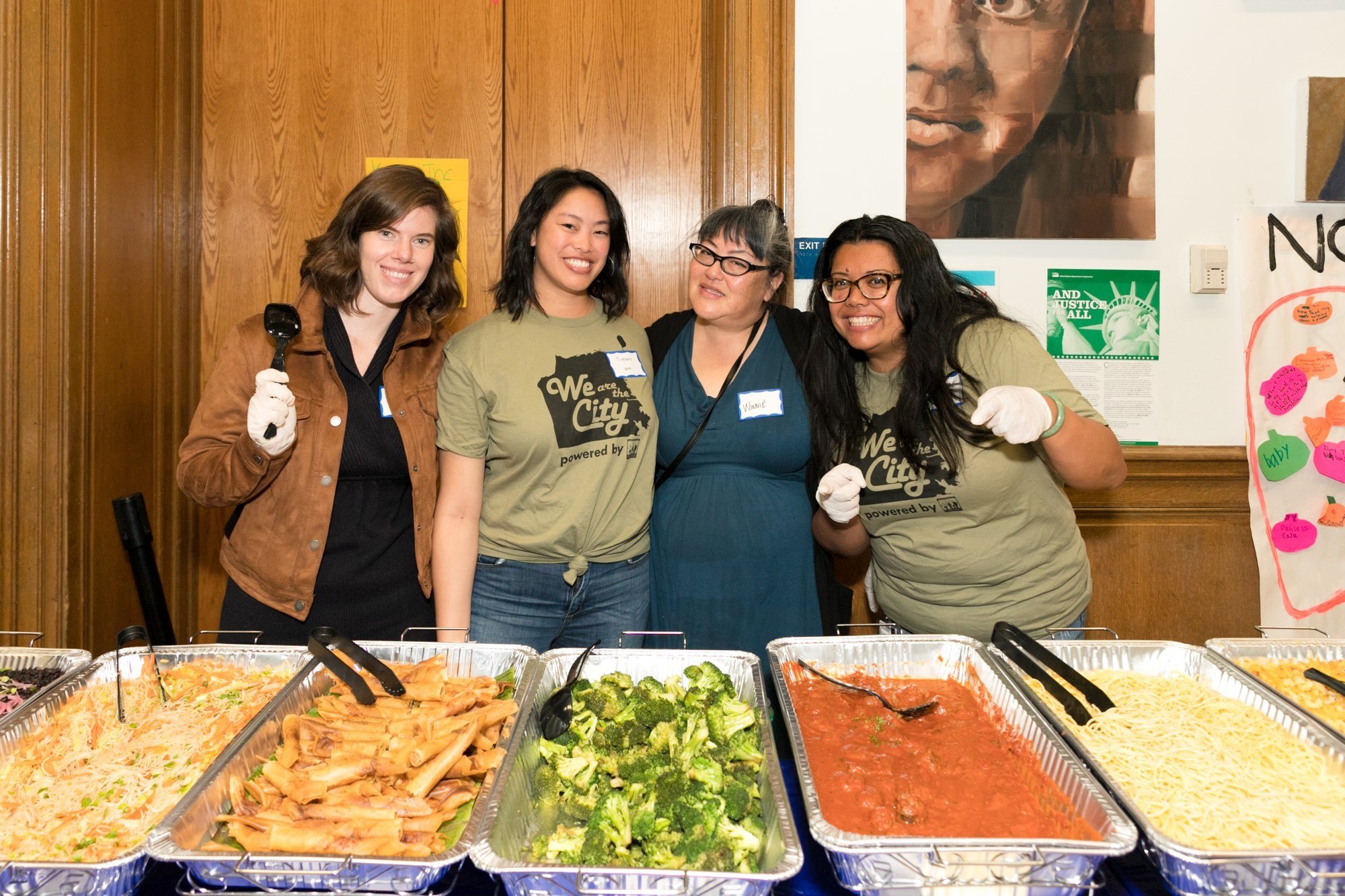  Former Members Joanna Powell (left) and Winnie Chen (center right) with DCYF Staff at a Family Summit event 