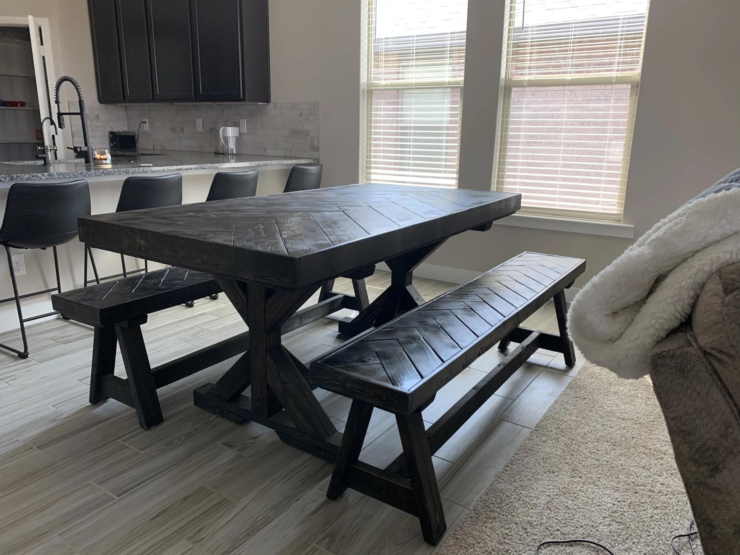 dark chevron design table with 2 matching benches.jpeg
