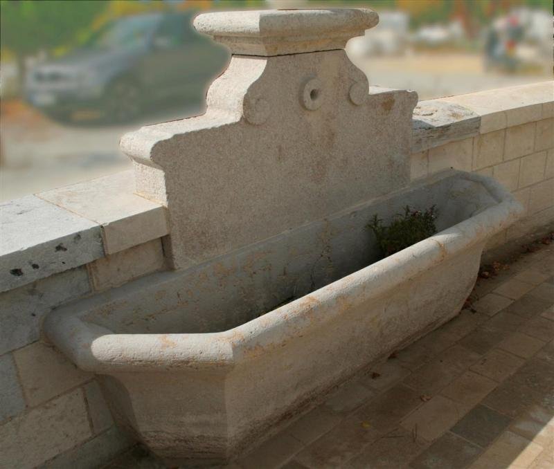  CUSTOM FABRICATION of a WALL FOUNTAIN and matching PAVING 
