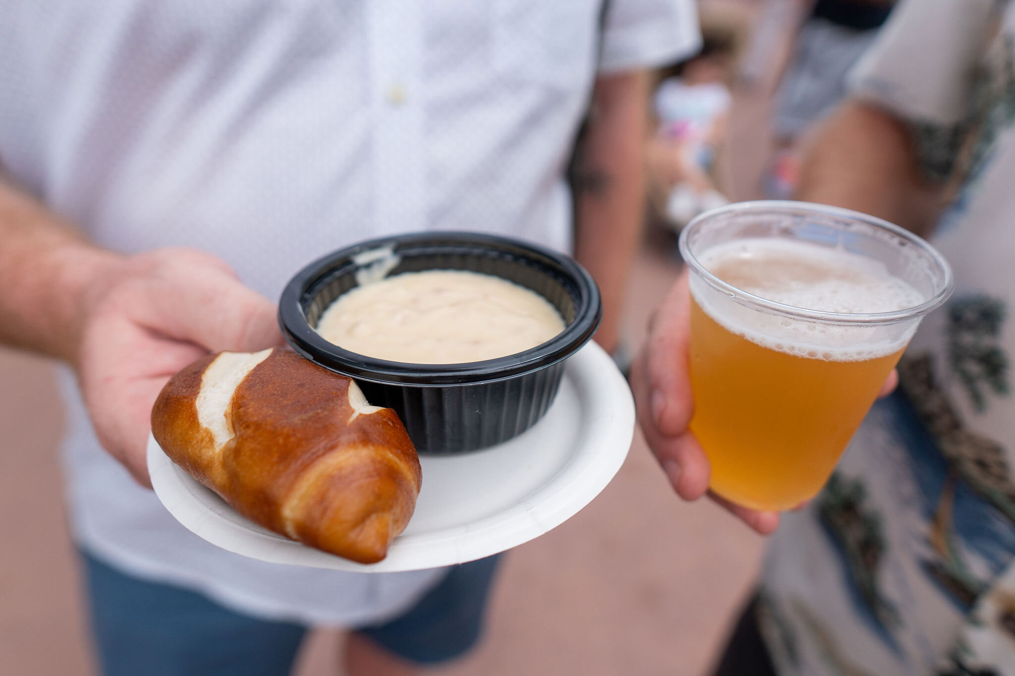Canada: Canadian Cheddar and Bacon Soup, served with a Pretzel Roll.