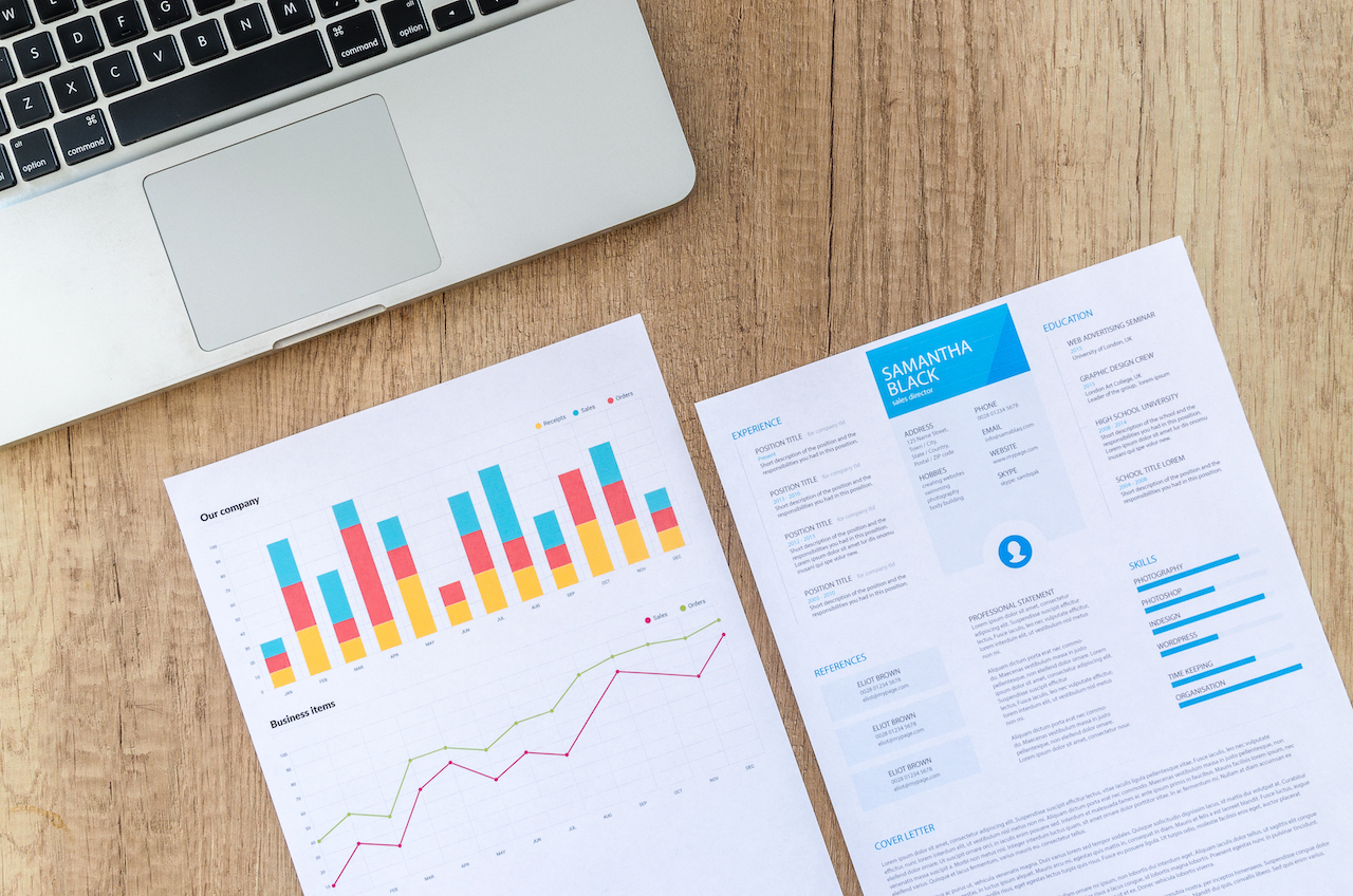 Canva - Workplace with Notebook on Wood Table.jpg