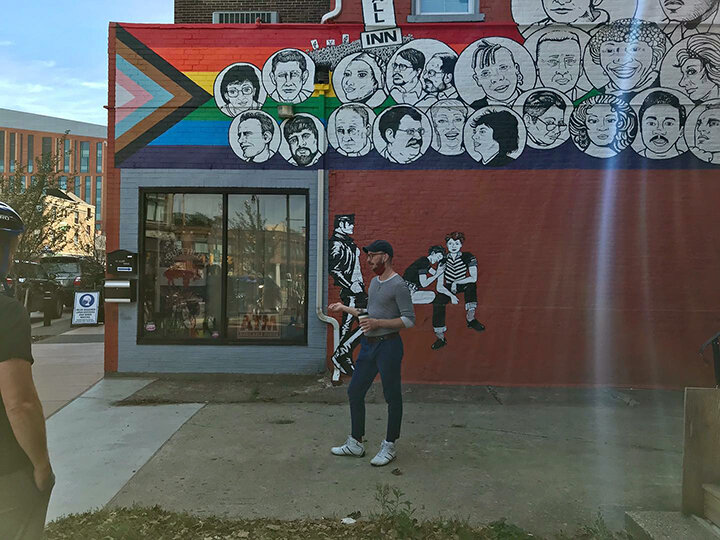 Artist Mickey Harmon in front of the new Stonewall Nation mural in Allentown, Buffalo