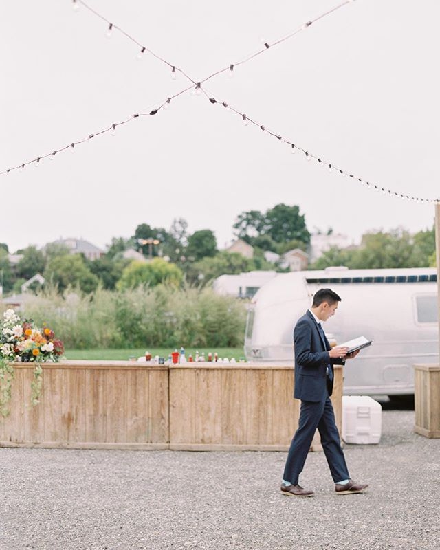The officiant taking a few pre-ceremony moments to review his notes under our bistro lights at @basilicahudson.
.
.
Photo: @jessicalorren
Planning: @nancyharrisevents
Florals: @dark_and_diamond
.
.
#lnjwedding #lnjweddings #basilicahudson #basilicahu