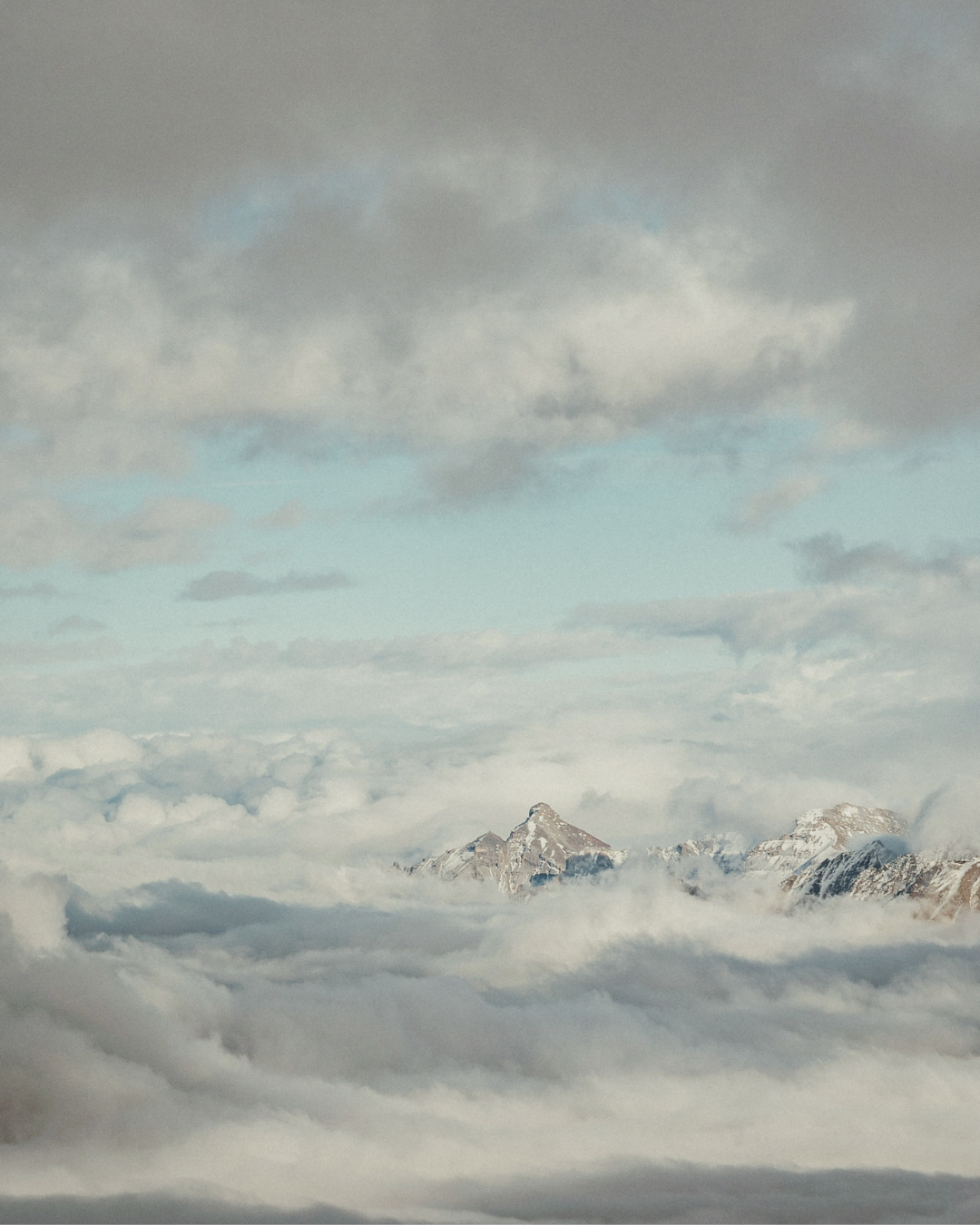 Mountains partially hidden by mist, representing emotional distance in relationships
