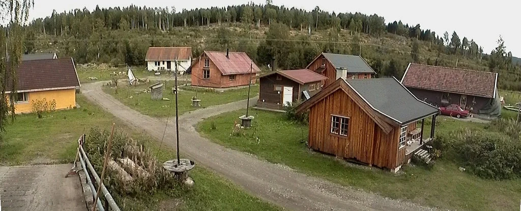 The first settlement, which is also the farm. These houses were mainly built by the ecovillagers.