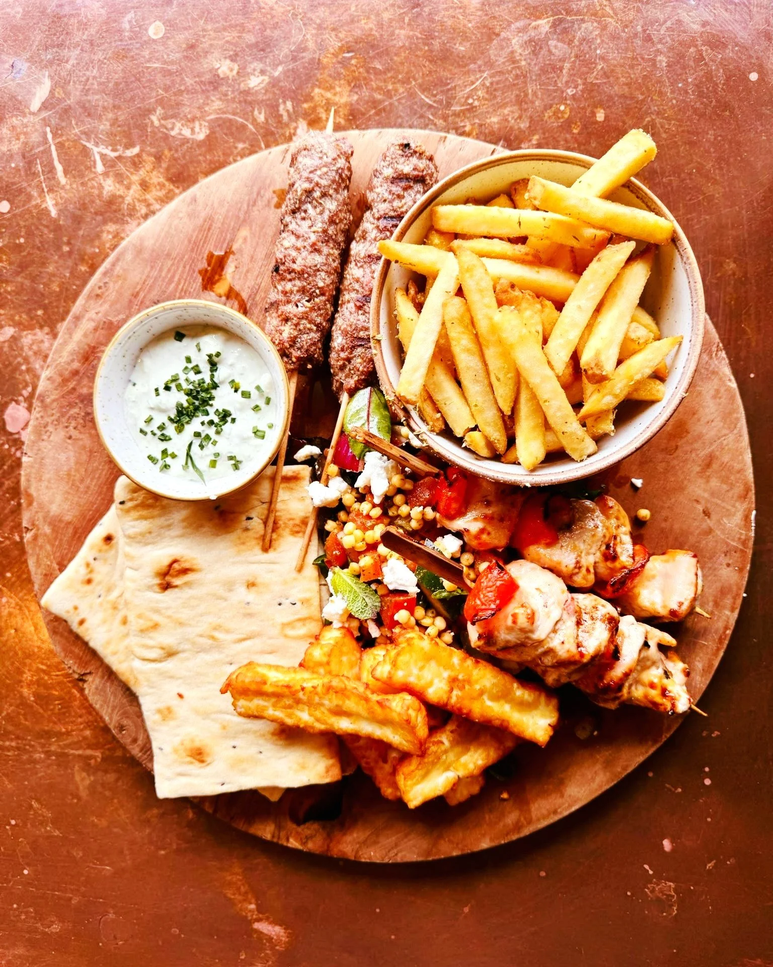 Grab a friend who isn't going to hog the Halloumi and dig into our Build Your Own Greek Gyros Platter from the Spring/Summer menu ☀️🇬🇷

Loaded with Kofta, Chicken Skewers, Halloumi, Garlic &amp; Oregano Fries, Greek Salad, Tzatziki, warm Flatbread.