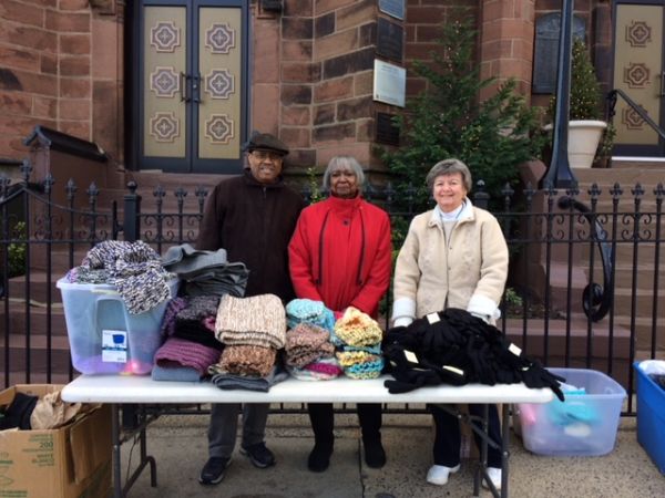 Handing out scarves