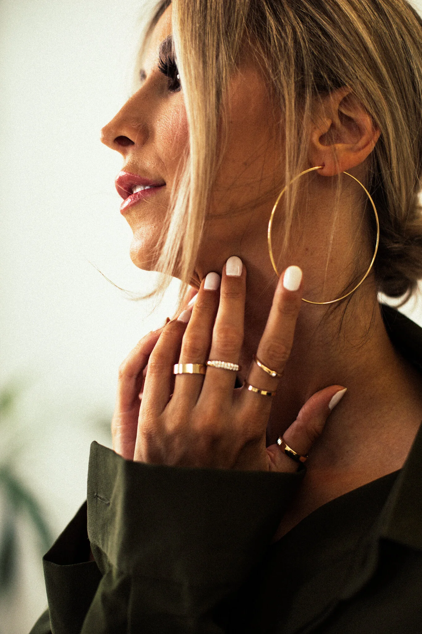  Photograph by: Jackie Sterna. Hair + Makeup by: Amanda Martinez Kelley. Edit by: Catie Menke. Location: Blok Photo Studios. Olive Suit:   PrettyLittleThing  . 