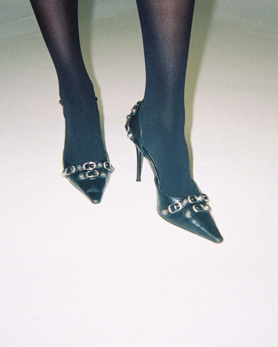Catie Menke Wilson's image of black designer heels at fashion photoshoot