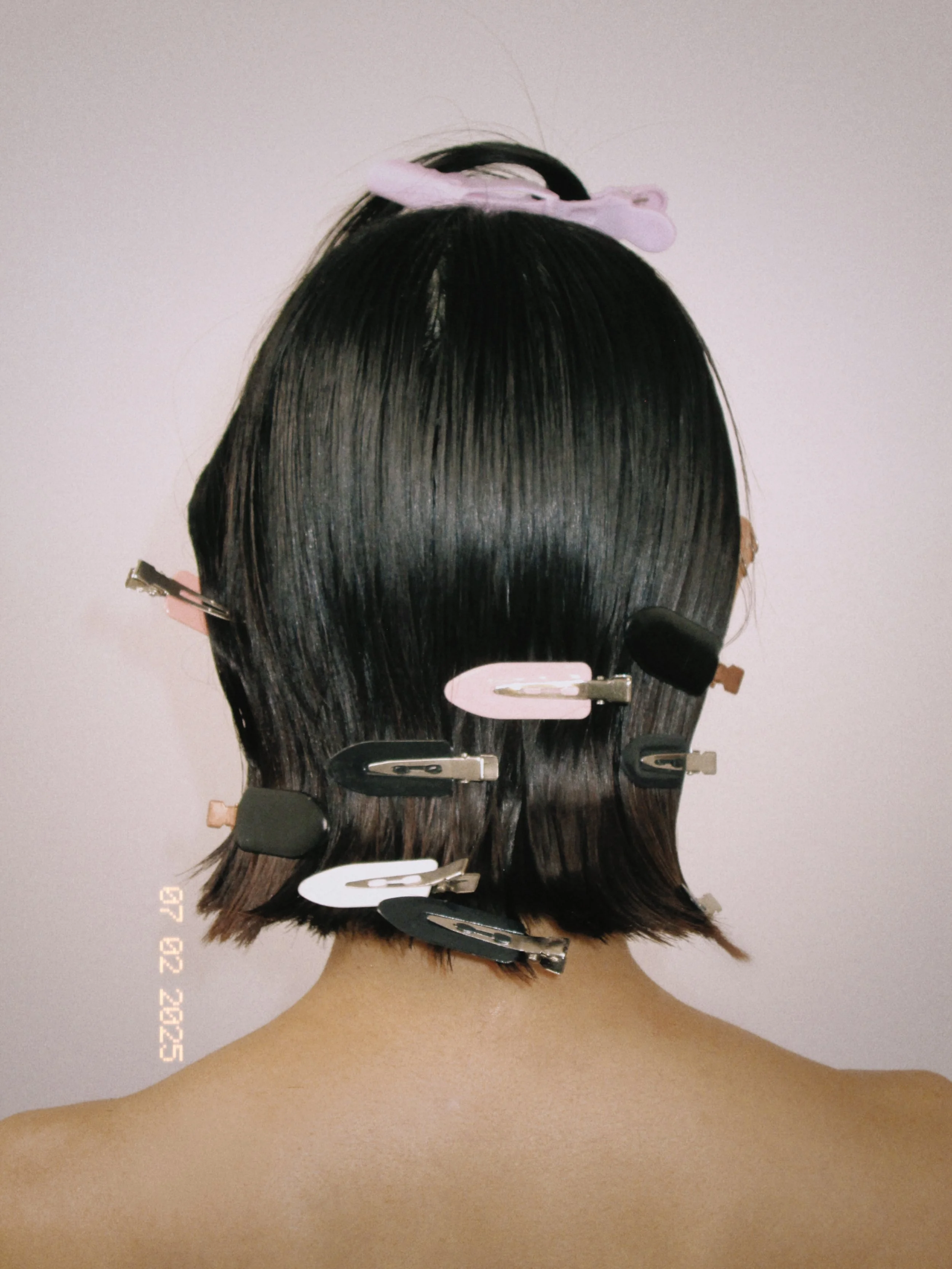 Catie Menke Wilson's beauty photography of back of hair with clips