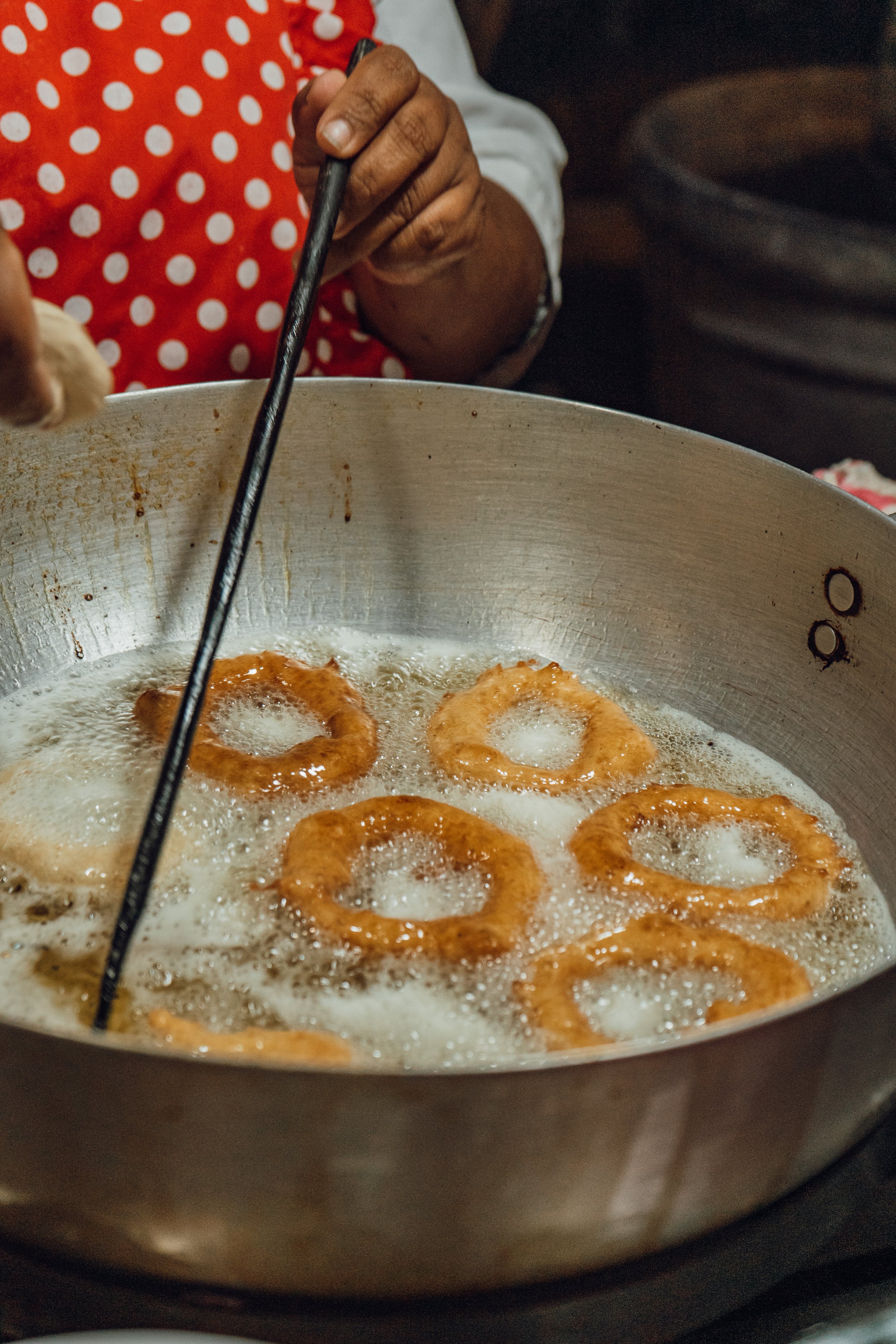 Picarones being fried
