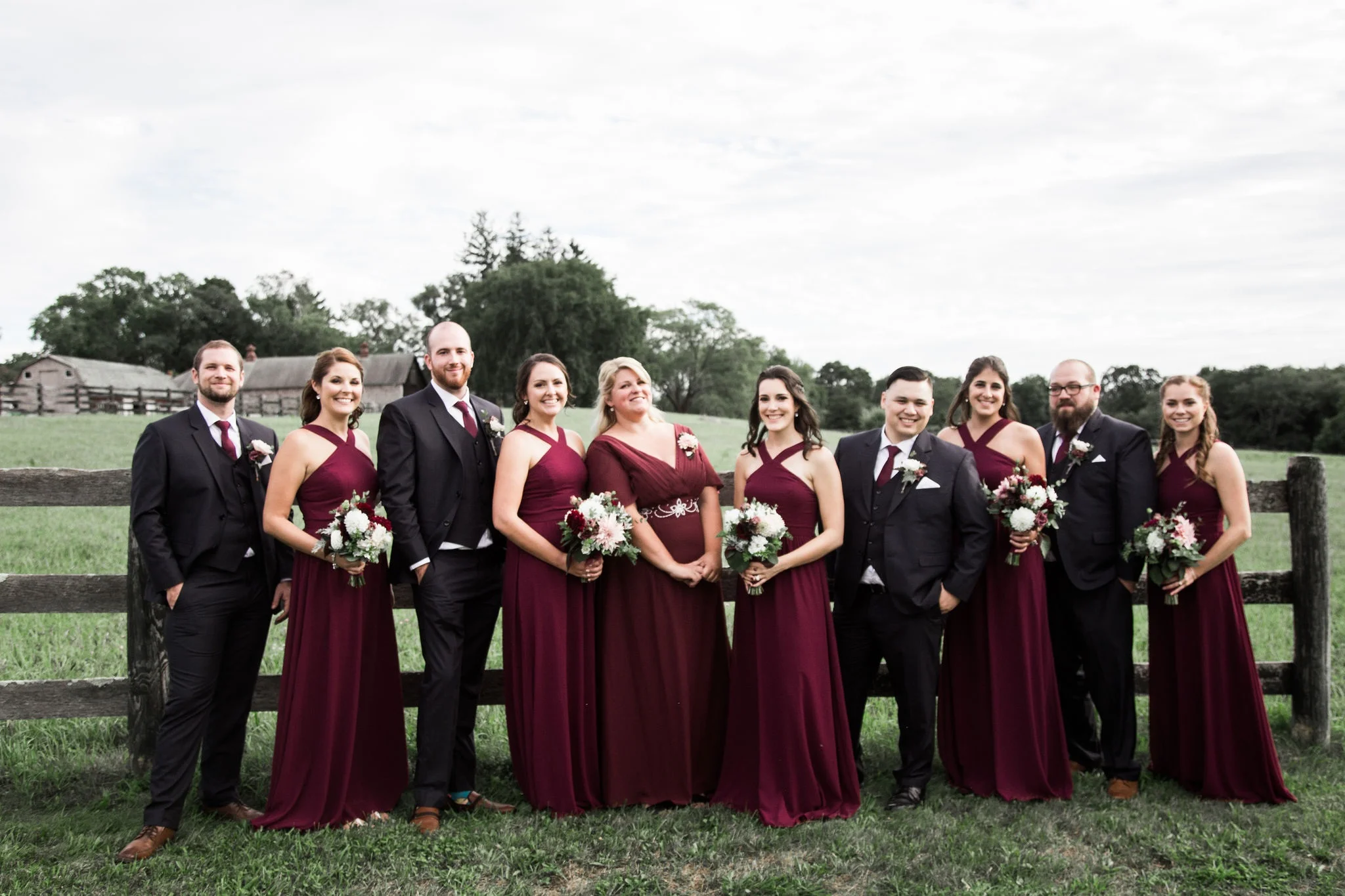 outdoor-wedding-group-picture-flowers.jpg