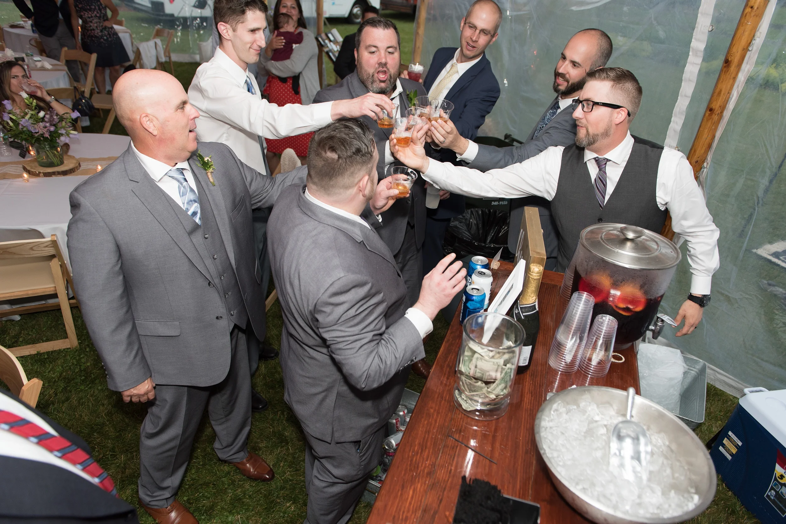 groomsmen-cheers-toast-bar-wedding.jpg