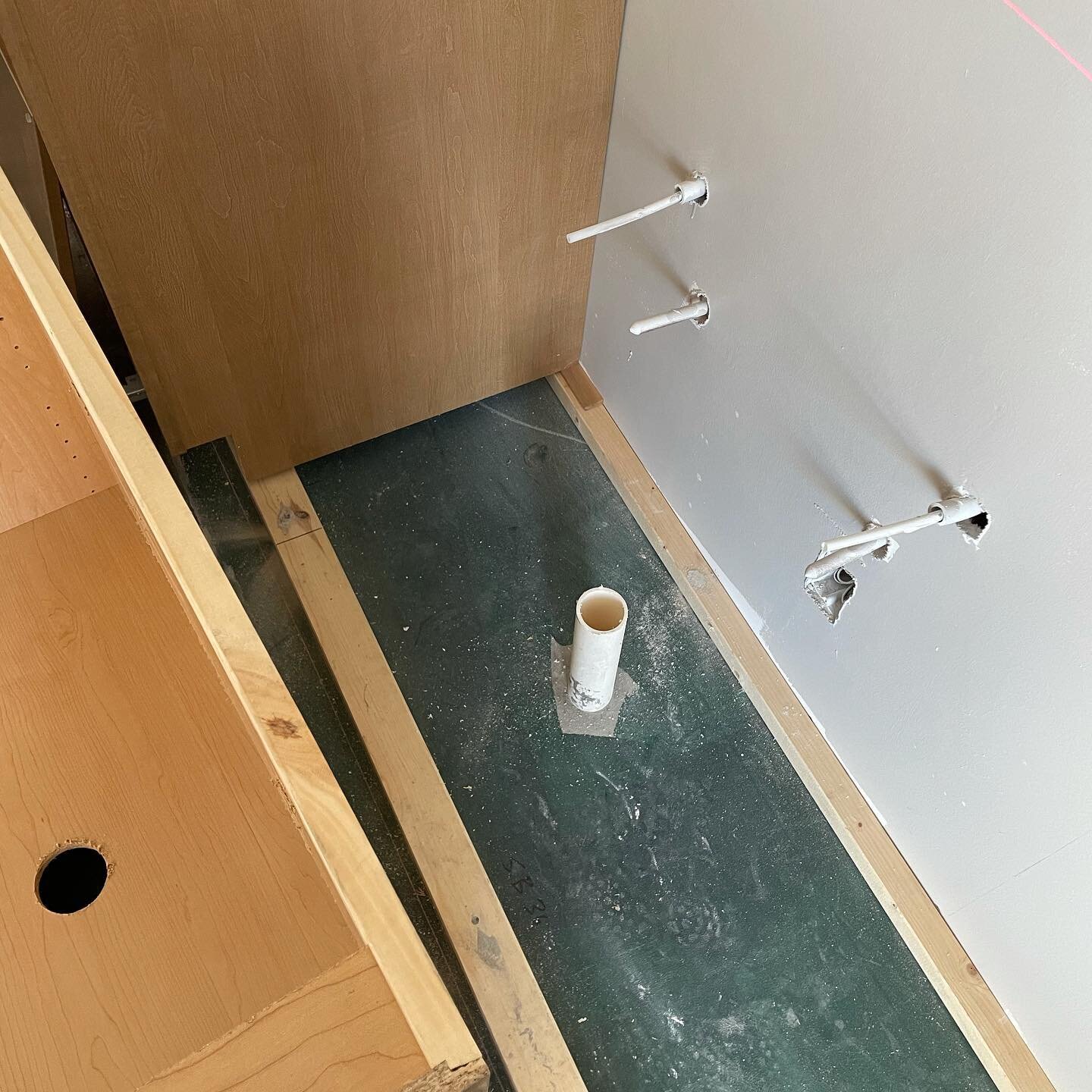 Pro tip!  Sometimes you get a sink base cabinet with a drain penetration on the floor and feed lines on the wall.  If you know anything about cubes, you&rsquo;ll know that it&rsquo;s pretty much impossible to cut these holes and install this cabinet.