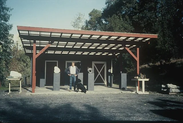  T Barny setting up his studio with his shop assistant Jake 