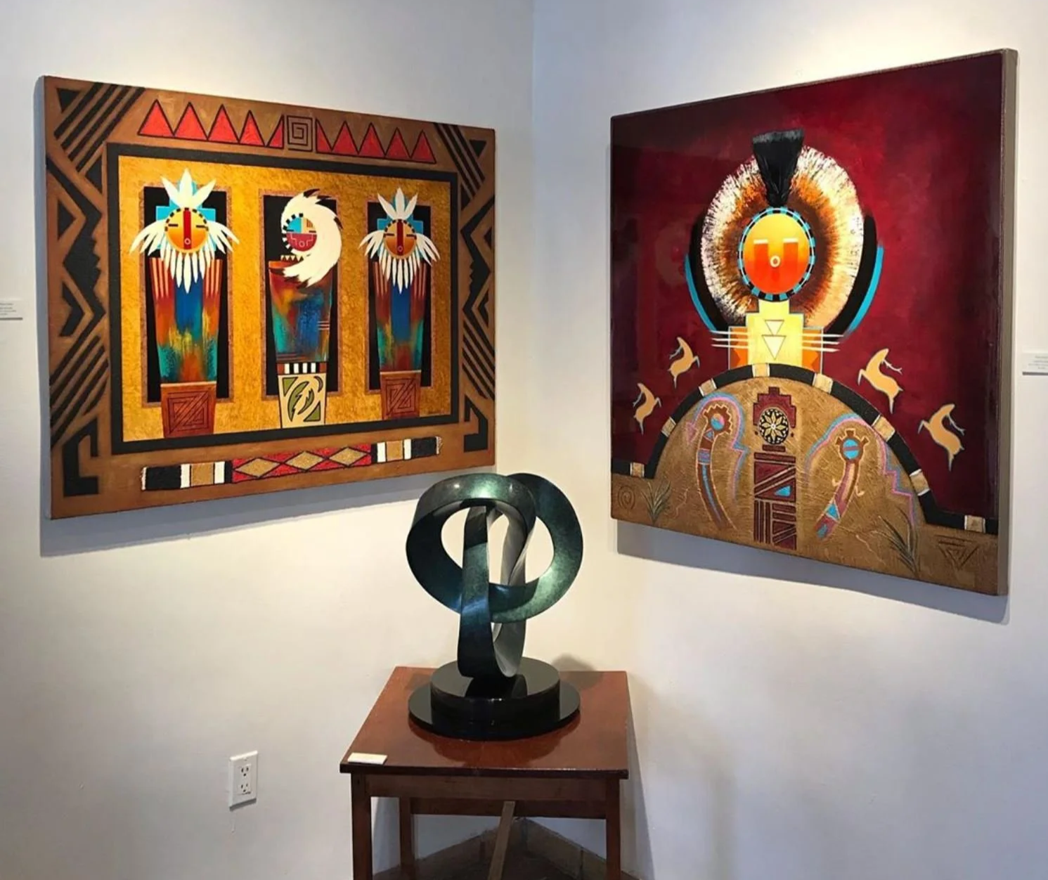  T Barny’s CIRCO with two of Poteet Victory’s paintings. 