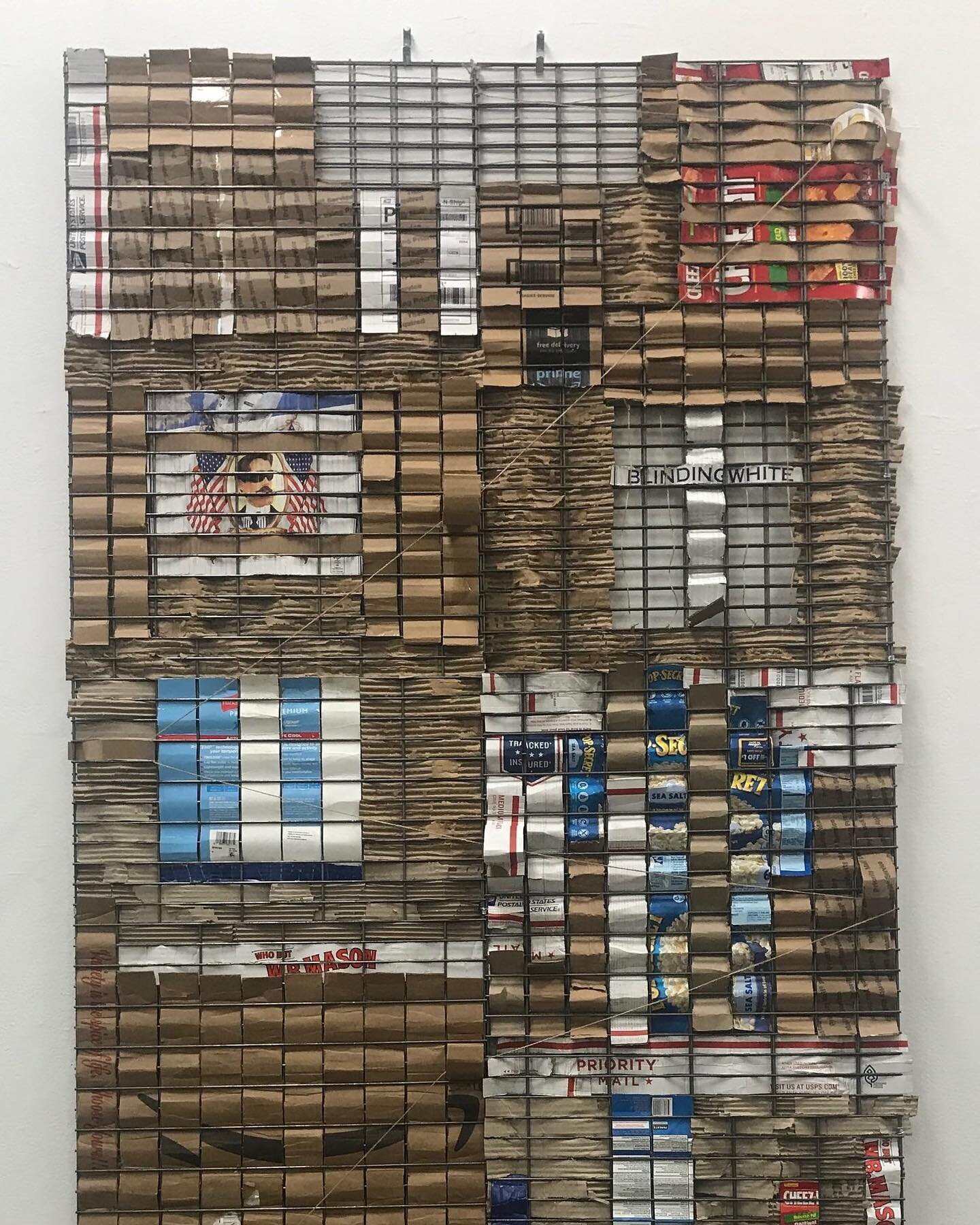 Wall Weaving Capitalism
  Another work in my weaving lab series, in this piece I comment on the system of Capitalism through the materials and logos that I weave into the metal grid. This was made when I was living in the nations capital through a ti