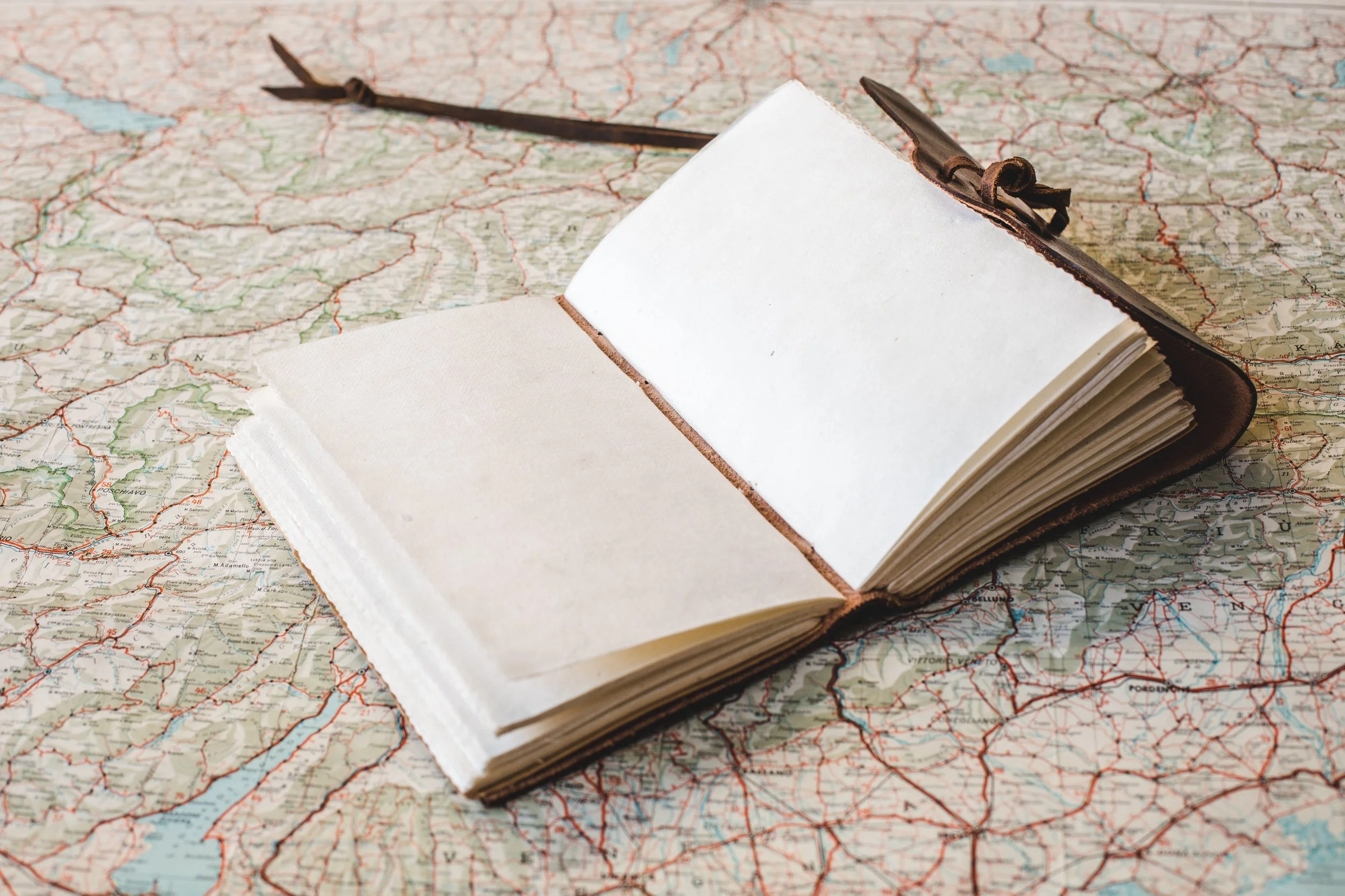 open-notebook-on-world-map_4460x4460.jpg