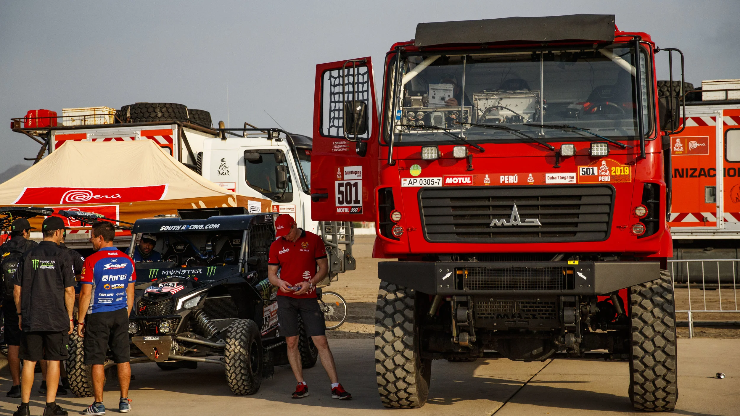 The T4 Truck towers over Casey’s Can-Am Maverick X3.