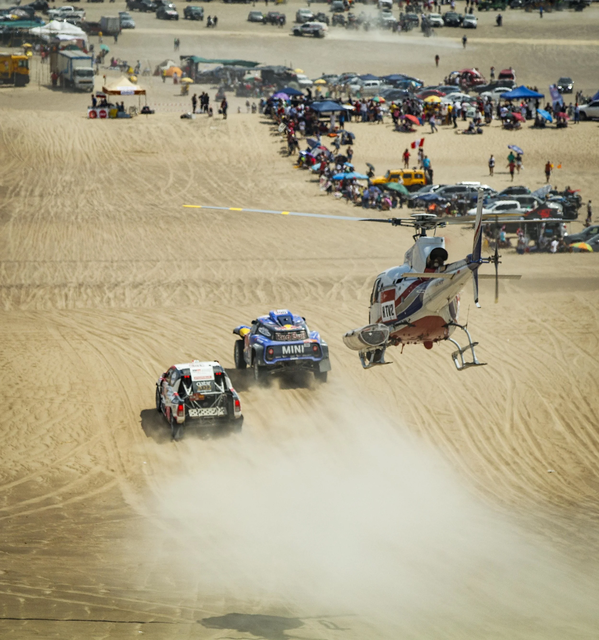 The finish of the car class was a drag race complete with helicopter in tow.