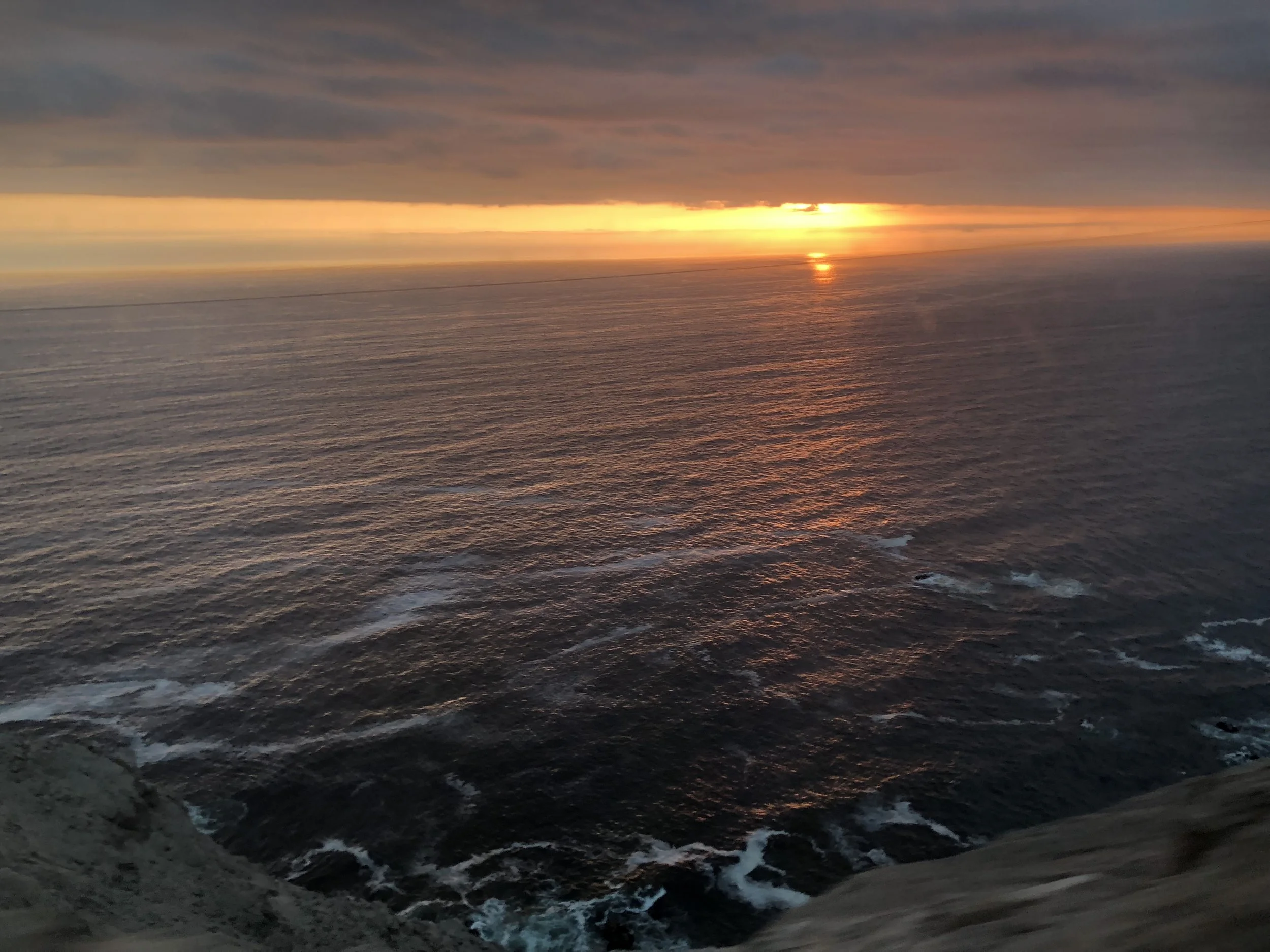 The dangerous cliffside provided an excellent view of the sunset.
