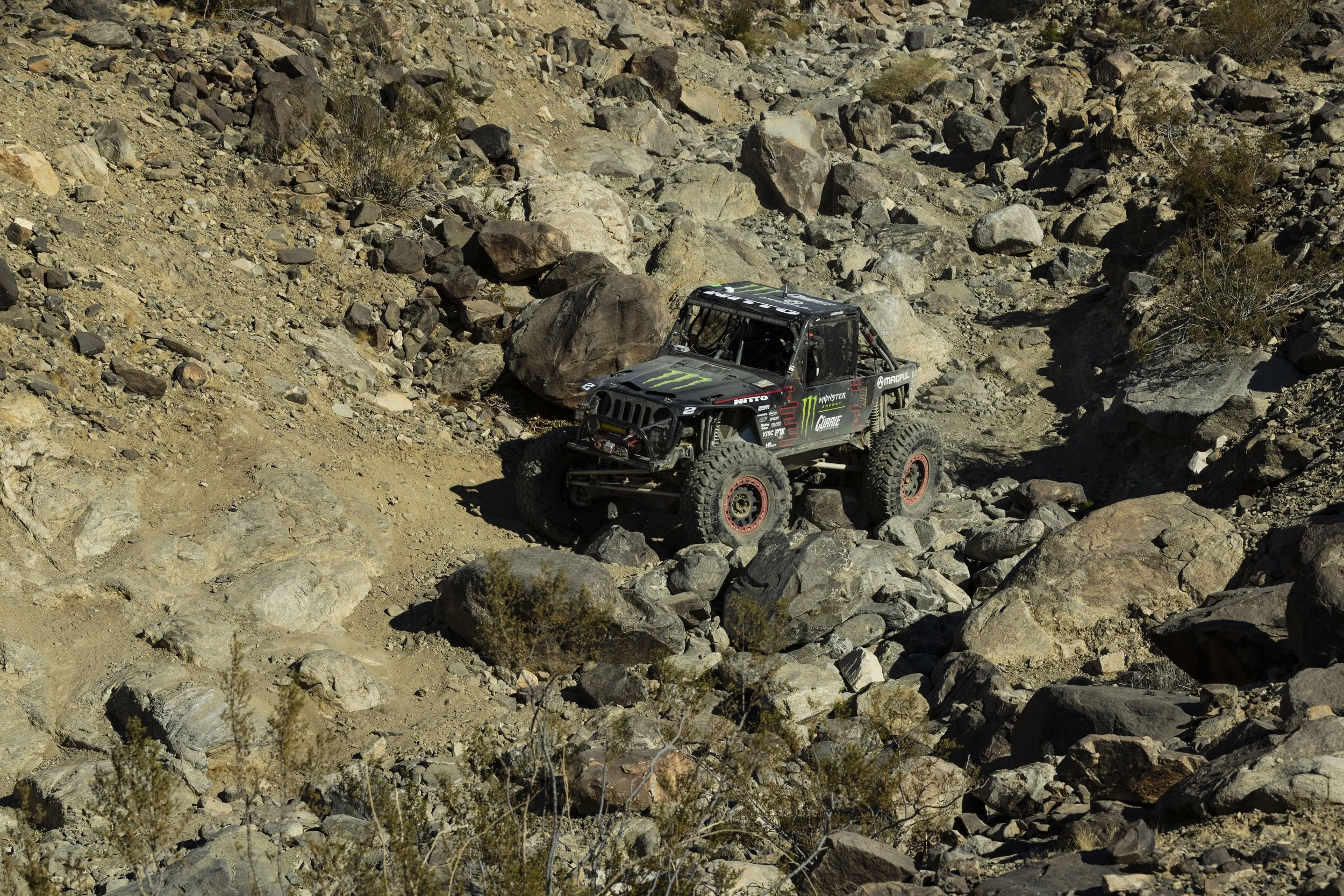 2_5_CaseyCurrie_KingofHammers_JohnsonValley_Day10_Ultra4Race_RockJeep_NoCrop_005.jpg
