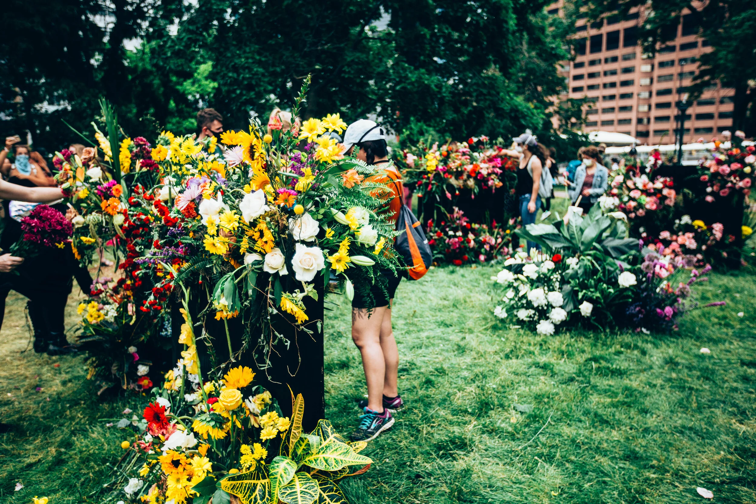 Protestors lay flowers for the victims of police brutality in front of the Capitol Building in Denver, CO.