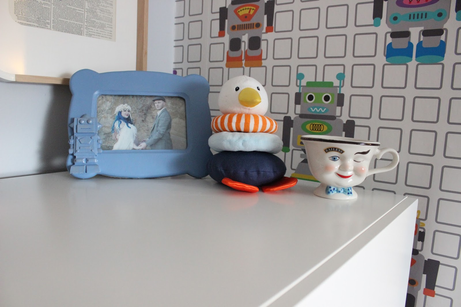 Frame: HomeGoods Stacker Toy: Ikea Leka Coffee cup: vintage