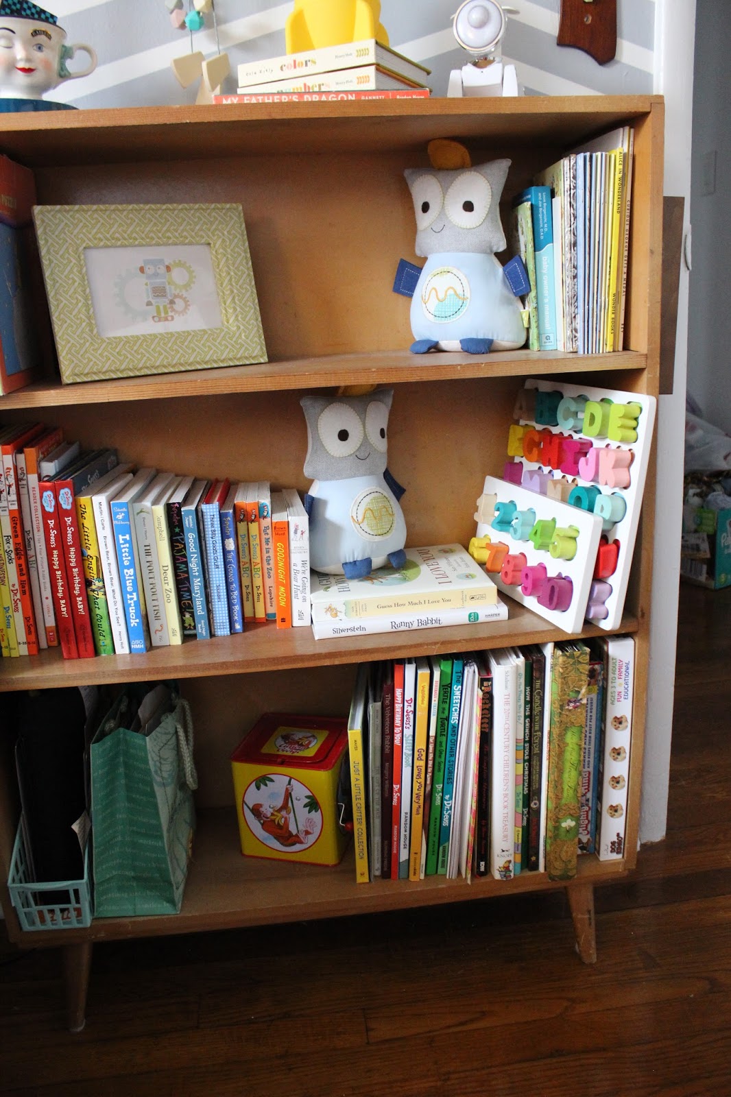 Photo frame: Lolli living Puzzles: Janod (I added velcro to the pieces to get them to stay like this.) Book ends: Lolli living