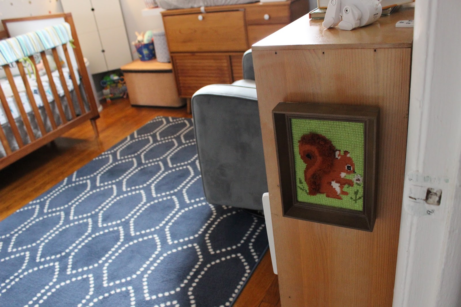 Squirrel needlepoint: estate sale (This was really just here because I bought this bookcase with a nail sticking out of it here that I wanted covered. This specific art has since been moved downstairs to the Playroom & swapped out for some space art.)