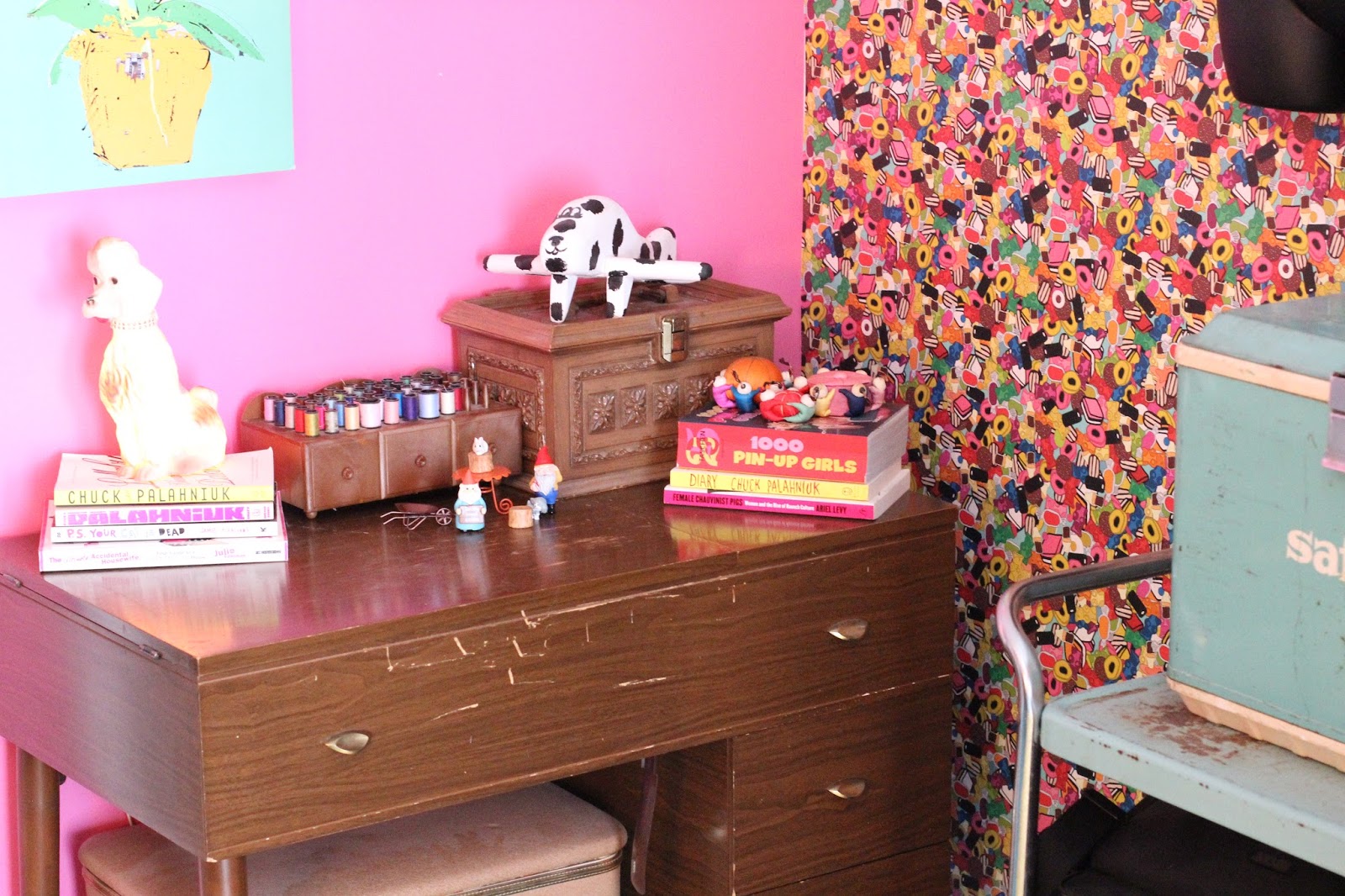 Mid-century sewing table (with sewing machine inside that I've never used) was an estate sale find that I keep telling myself I'm going to fix up and use one day. I made that plane in shop class in junior high! Poodle is a vintage estate sale find.