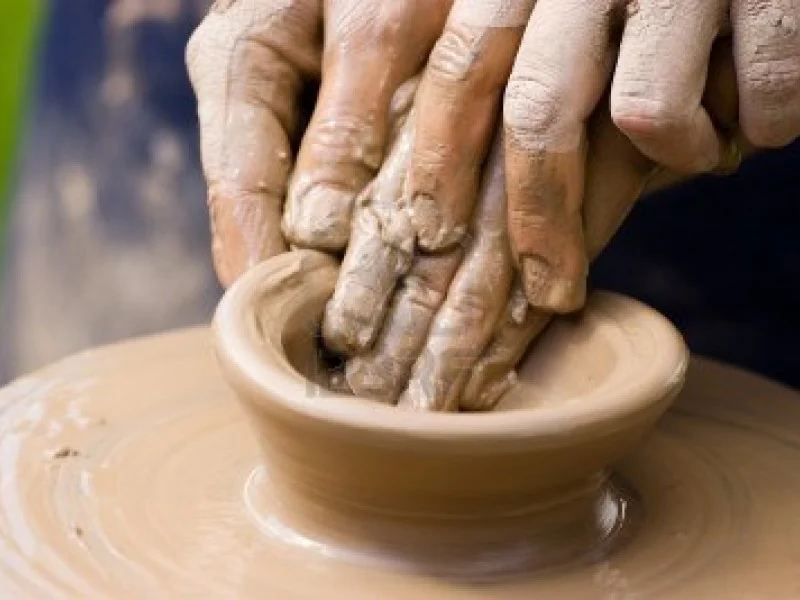 kids pottery adult hands.jpg