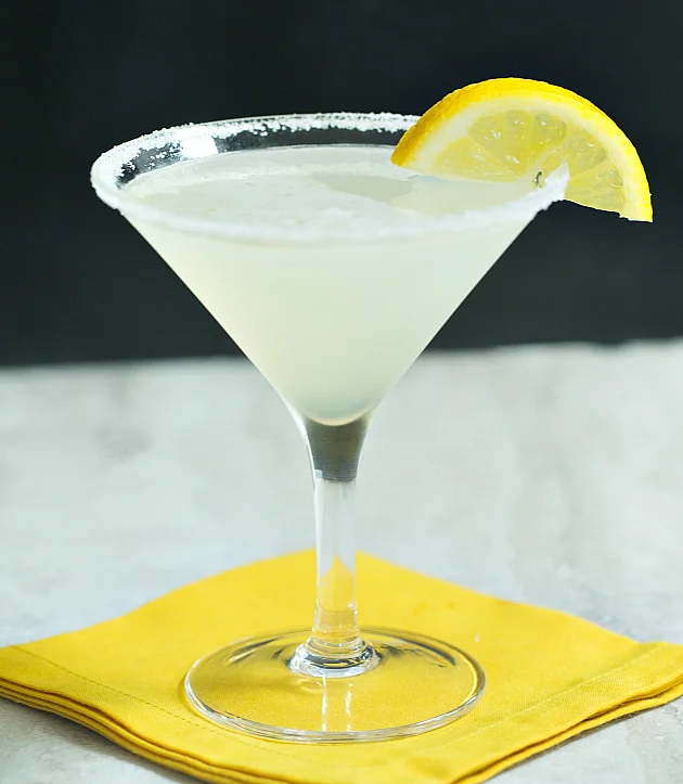 SOUTH FORK LEMON DROP (SERVES 2) 3 oz South Fork vodka 1 oz orange liqueur 1 tbs superfine sugar or to taste 1.5 oz freshly-squeezed lemon juice Ice cubes Superfine sugar for dipping Twisted peel of lemon Mix the vodka, orange liqueur, sugar, and lemon juice in a cocktail shaker half-filled with ice; shake well. Pour strained liquor into sugar-rimmed martini cocktail glass and garnish with a twisted peel of lemon. To create a sugar-rimmed glass, take a lemon wedge and rub the drinking surface of the glass so it is barely moist. Dip the edge of the glass into the superfine sugar.