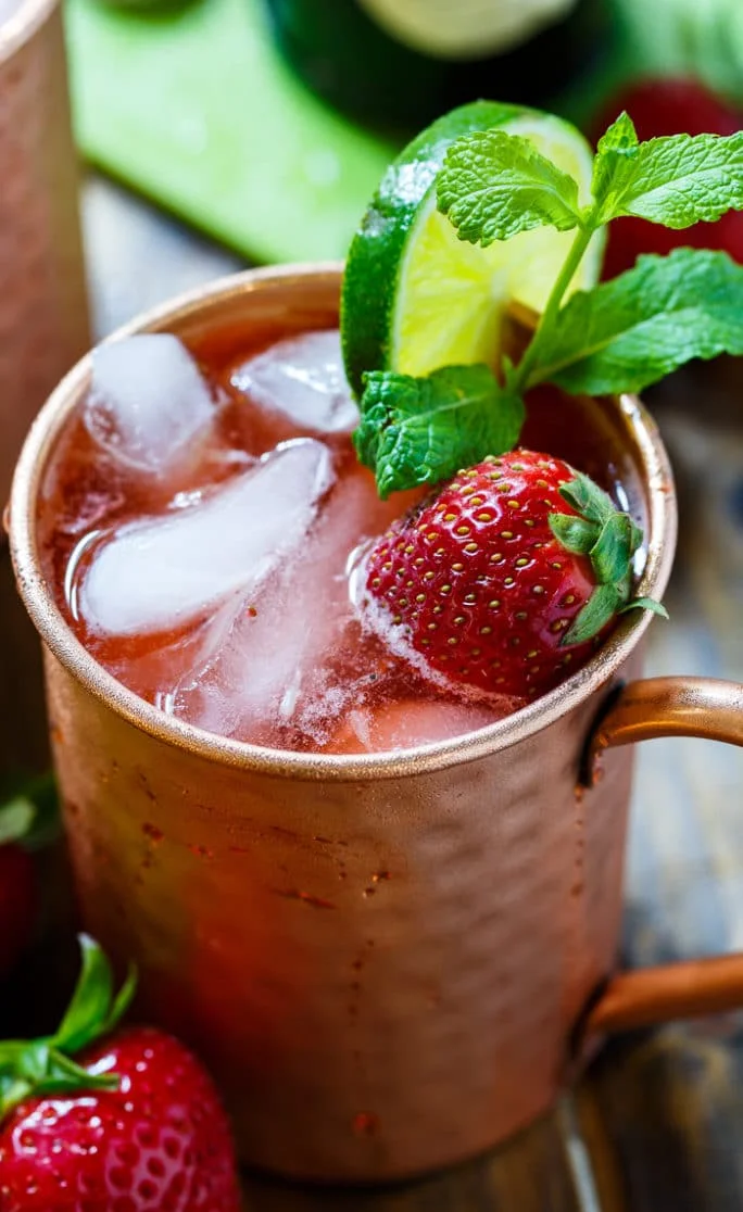 STRAWBERRY MOSCOW MULE (SERVES 2) 3 oz South Fork Vodka 1/3 cup sugar 1/3 cup water 1 cup chopped fresh strawberries 2 tbs lime juice 1 bottle ginger beer Combine sugar and water in a small saucepan and bring to a simmer, stirring to dissolve sugar. Add strawberries. Mash strawberries with a fork and let mixture simmer for 10 minutes. Remove from heat and let cool. Pour mixture through a fine-meshed sieve into a bowl and press on mixture with a rubber spatula to get all liquid out. Add 1/2 cup strawberry mixture to a pitcher along with lime juice and vodka. Stir well. Add ginger beer and stir. Pour into glasses or copper cups with ice.
