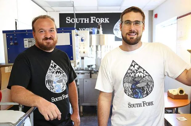 South Fork Vodka creators Dan Kennerson (left) and Jon Dorfman discuss some of what goes into making their new vodka brand. Many who have offered blind taste tests say South Fork is among the best vodkas out there. Photo: Elias Funez/efunez@theunion.com