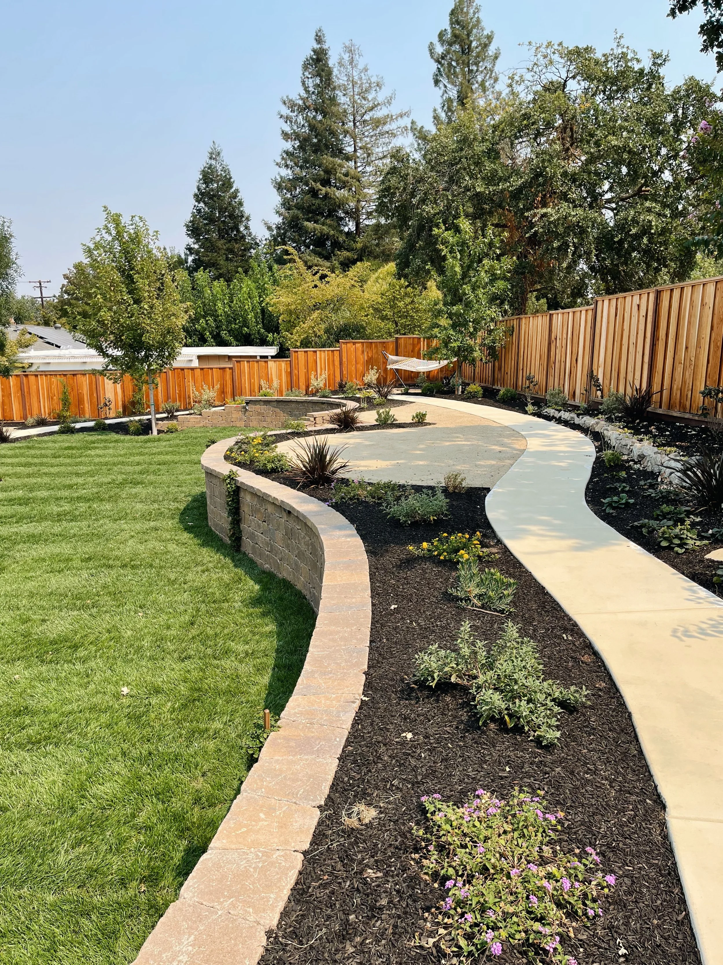 Signs That It's Time to Hire a Professional Landscaper