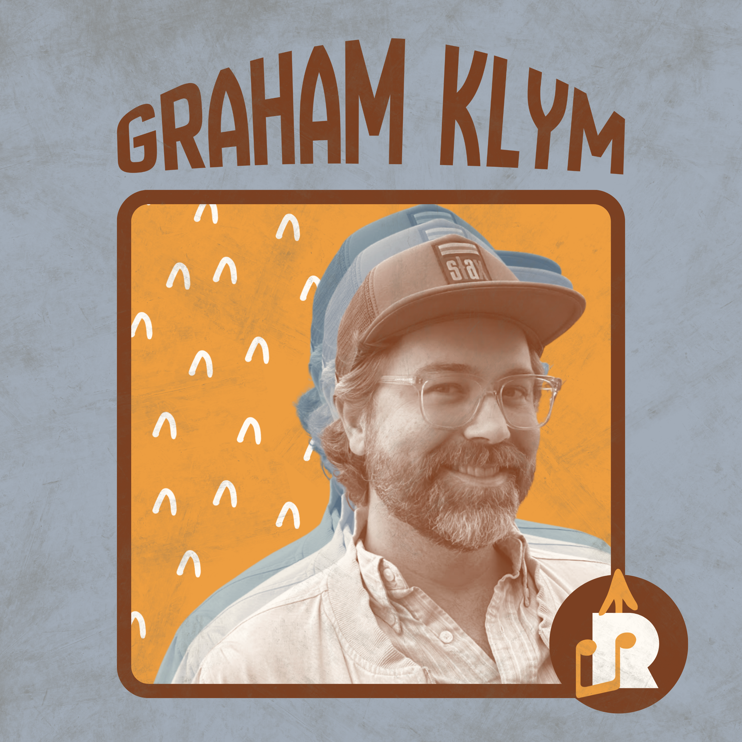 Book cover with the title 'Graham Klym' featuring a man with glasses, a beard, wearing a beige shirt and a trucker hat, smiling, with a backpack, set against an orange background with white doodles, and a logo in the bottom right corner.